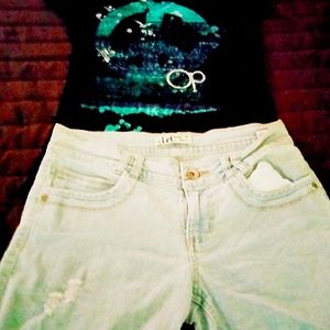 Cut off light colored Jean Shorts with OP Shirt